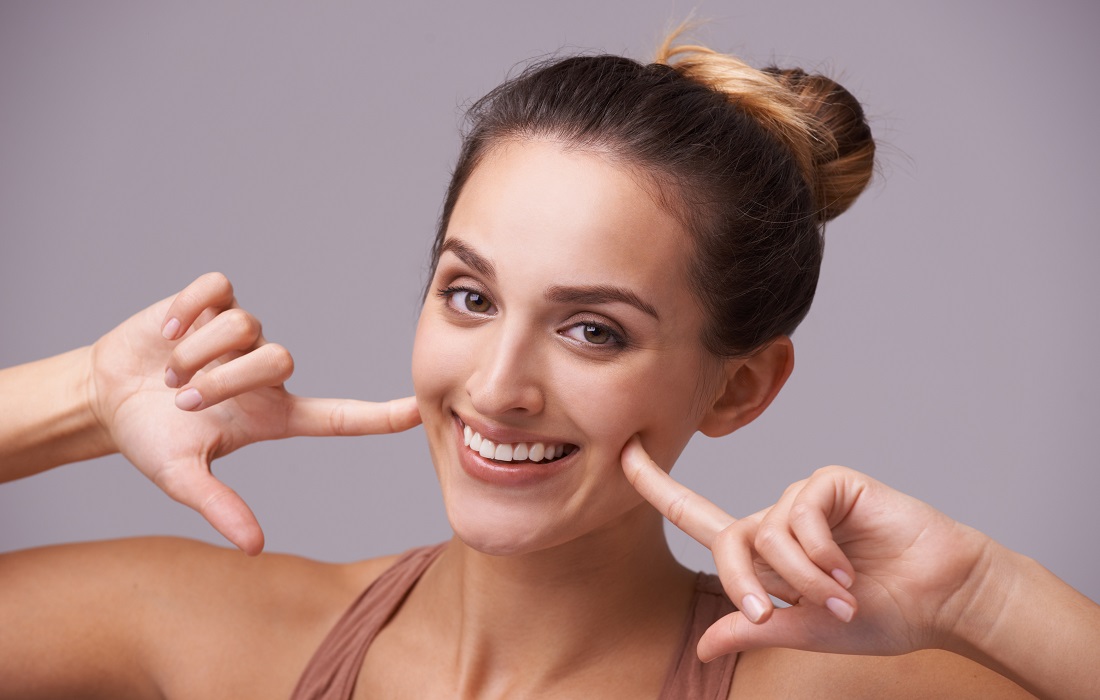 A Young girl feeling fresh after face wash